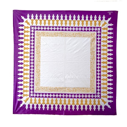 "Purple cotton table cloth, 150cmx150cm, adorned with a verse written by the poet Al Mutanabi describing how people's true selves is shown in how generous they are. عَلى قَدرِ أَهلِ العَزمِ تَأتي العَزائِمُ وَتَأتي عَلى قَدرِ الكِرامِ المَكارِم. "